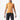 a man in a bikini standing on a surfboard