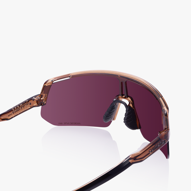 Load image into Gallery viewer, TECHNIUM L, TRANSPARENT BRONZE FRAME WITH RIDESCAPE BRIGHT LENS AND CLEAR SPARE
