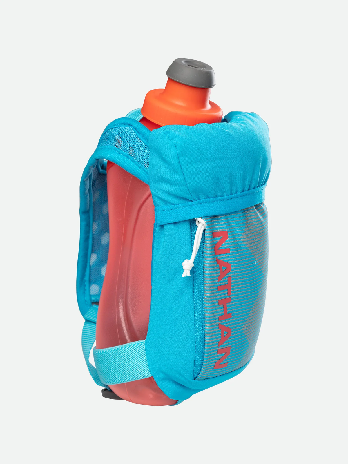 a person in a blue jacket holding a suitcase 