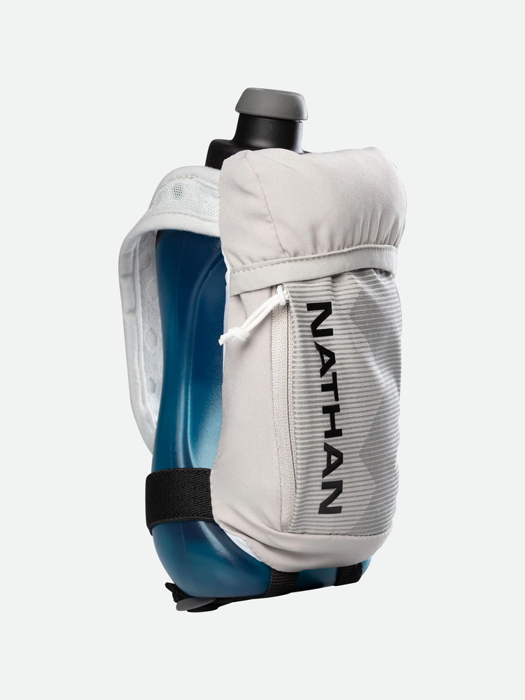 a man holding a suitcase and a backpack 